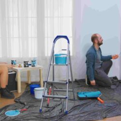 couple-conversation-home-renovation-roller-brush-dipped-blue-paint-apartment-redecoration-home-construction-while-renovating-improving-repair-decorating (1) (1)