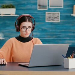 university-student-using-headphones-laptop-attend-online-class-video-call-meeting-woman-talking-teacher-remote-videoconference-educational-live-communication_482257-43337