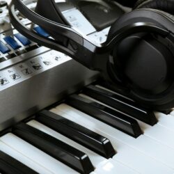 headphones-synthesizer-close-up_392895-347872